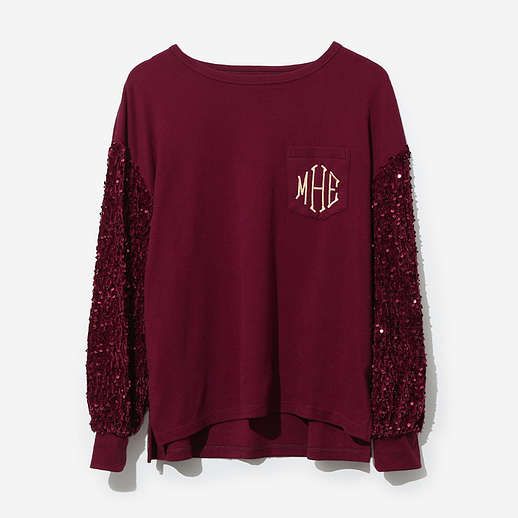 Add a touch of sparkle to your holiday wardrobe with this Sequin Sleeve Sweatshirt, available in black or burgundy! Perfect for holiday parties or festive outings, this sweatshirt features eye-catching sequin sleeves that add just the right amount of glam. With a cozy, relaxed fit and soft fabric, you’ll stay comfortable while looking chic all season long. It’s the perfect blend of casual comfort and holiday fun!Made of PolyesterModels are wearing their normal size; for more information about Marleylilly fit, click on “Learn more about sizing”Body length of a size S/M is approximately 26 inches in the front and 27 inches in the back Winter Tops With Contrast Sequin, Winter Contrast Sequin Tops, Long Sleeve Tops With Contrast Sequin For Fall, Contrast Sequin Long Sleeve Tops For Fall, Fall Party Cotton Tops, Cotton Tops For Fall Party, Fall Sequin Long Sleeve Sweatshirt, Sequin Long Sleeve Sweatshirt For Fall, Sequined Long Sleeve Fall Sweatshirt