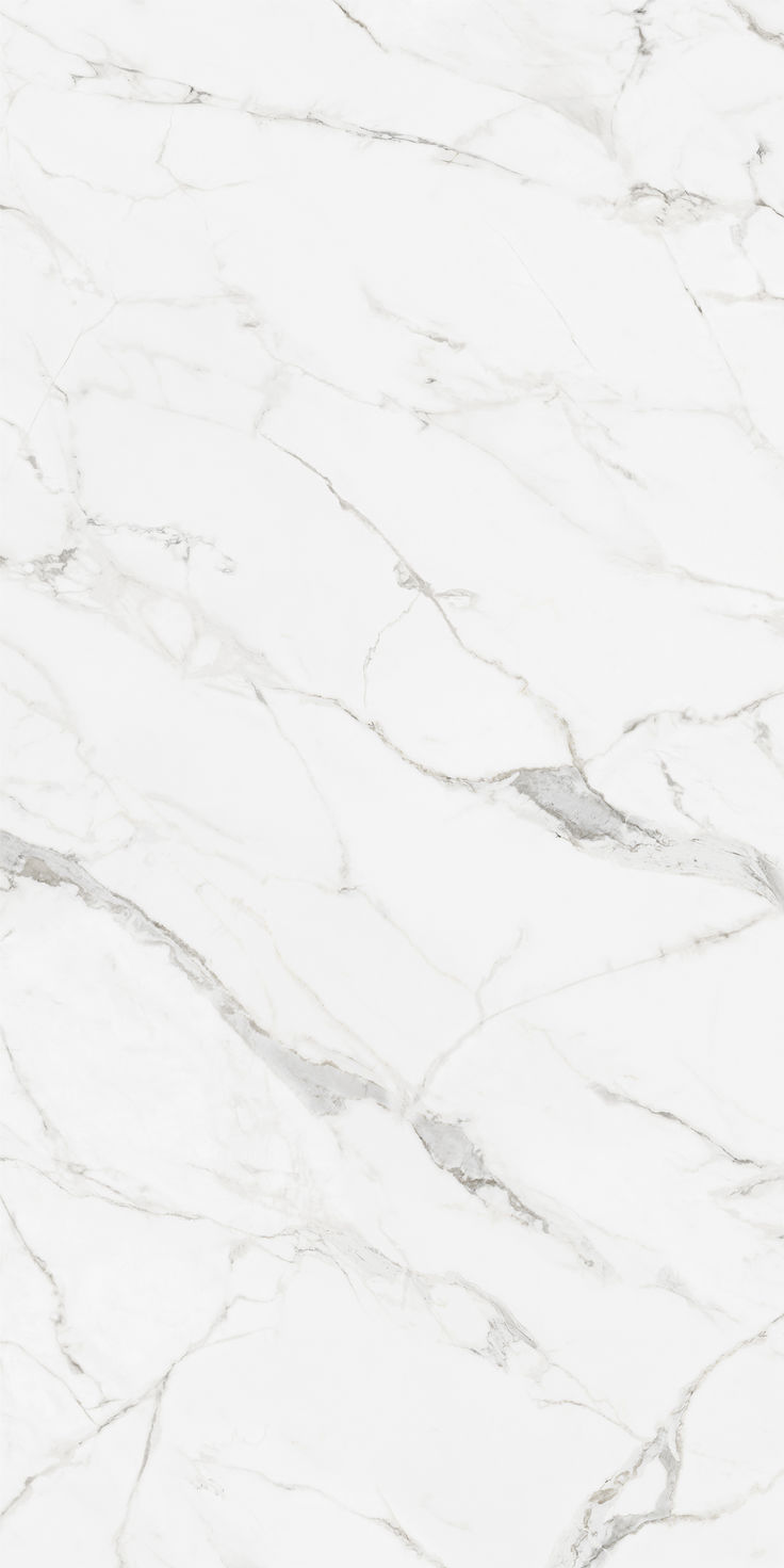 Image is the large-format porcelain slab color in Bianco Statuario. It is white background with detailed gray veining. White Italian Marble Texture Seamless, Satvario Marble Texture, White Marble Texture Seamless, White Marble Countertops Kitchen, White Marble With Grey Veins, White Stone Texture, Marble Design Texture, Luxury Marble Texture, Italian Marble Texture