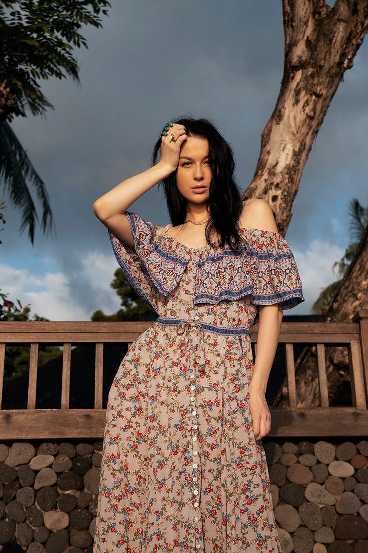 Drift away on a cloud of wildflowers in our perfectly romantic Jolie Maxi Dress. This exquisitely detailed gown is the Queen of our Ditsy Charm collection and might just become your favorite dress of all time. The gown features a flattering ruffled neckline which can be worn on or off the shoulder. This truly stunning vintage inspired gown will take you to summer parties and sunset cocktails with your favorite sandals and a flower in your hair. This is the ultimate dress for romantic walks along Bohemian Ditsy Floral Maxi Dress For Garden Party, Feminine Floral Print Boho Dress For Garden Party, Spring Lavender Bohemian Maxi Dress, Bohemian Ditsy Floral Print Dress For Garden Party, Bohemian Ditsy Floral Dress For Garden Party, Bohemian Ditsy Floral Print Garden Party Dress, Bohemian Lavender Maxi Dress For Summer, Bohemian Flowy Floral Dress For Garden Party, Feminine Flowy Boho Dress For Garden Party