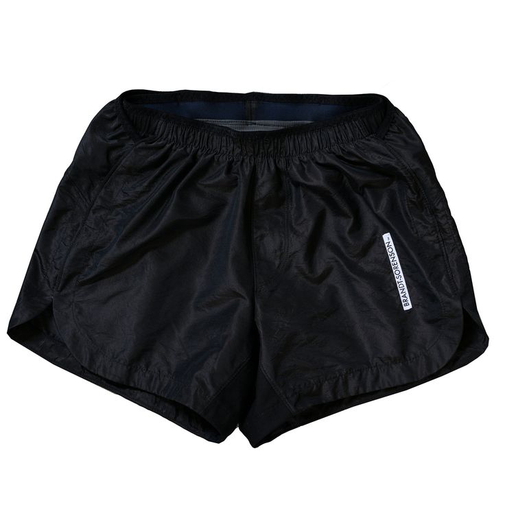 Pure silk taffeta run shorts in black with 5" inseam liner. Articulated merino liner with rib knit nylon thigh compression. Pure silk shell is ultralight, anti-bacterial and insulates in both hot and cool conditions. 5 balanced pockets with key clip. Single needle hems with elasticized waistband graded to your body measurements. *11 panels/ 3 textiles *100% pure silk shell *Nylon/ Merino liner *Wicking Support Liner 5" inseam *5 hip pockets *Elastic waistband with drawcord *Ultralight natural silk fabric *Single needle finished hems *Made-to-measure and built to order in our Los Angeles workshop, please allow 3-16 weeks. After checkout, follow our measuring chart (including thigh) and submit your measurements to info@brandt-sorenson.com Black Nylon Athletic Shorts, Black Nylon Athletic Shorts With Short Leg, Black Nylon Sports Shorts, Black Nylon Gym Shorts, Black Nylon Running Shorts, Black Nylon Running Bottoms, Black Nylon Workout Shorts, Black Compression Athletic Nylon Shorts, Black Nylon Athleisure Shorts