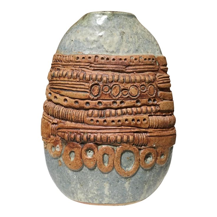 a decorative vase is shown on a white background