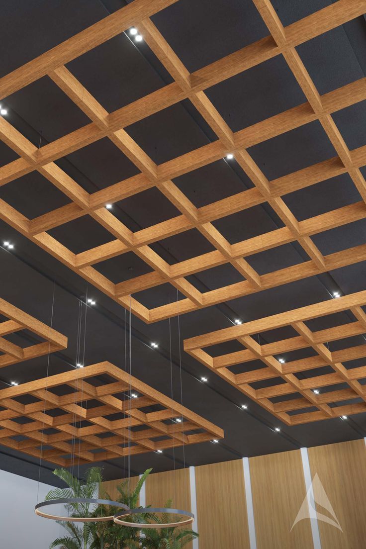 a ceiling with wooden beams and suspended lights