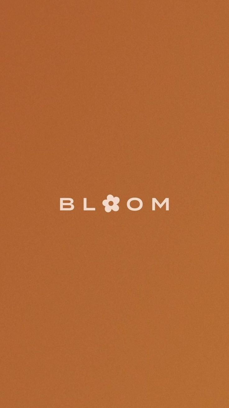 the word bloom written in white on an orange background