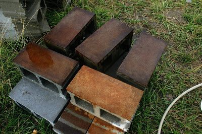 several pieces of wood sitting in the grass