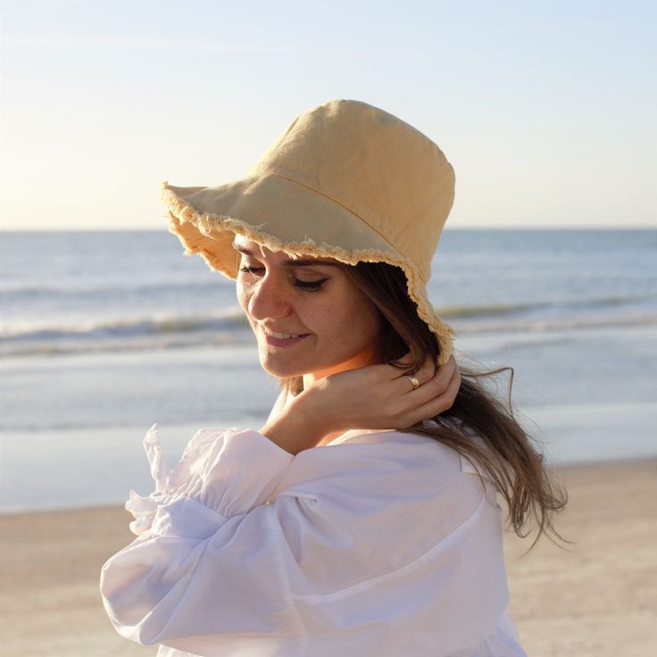 "Sunhat for Women, Beach Hats Womens Foldable, Casual Distressed Bucket Hat, 100% Washed Cotton Vacation Travel Accessories Best Gift, Khaki ■ Distressed Bucket Hat - unique fringe edge will complement every outfit whether a summer dress or swimsuit. Foldable & packable sun hats for women convenient to carry along, fits any handbag or backpack. This summer bucket casual hat is great for any summer outdoor activity - beach, traveling, vacation. Material: skin-friendly quick-drying and breatha Adjustable Yellow Fedora For Beach, Adjustable Cap For Warm Weather, Beige Sun Hat Cap For Vacation, Beige Wide Brim Mini Hat For Beach, Beige Cap Style Sun Hat For Vacation, Natural Color Sun Hat Cap For Vacation, Beachy Spring Cap Hat, Beige Coastal Hat With Flat Brim, Yellow Adjustable Fedora For The Beach