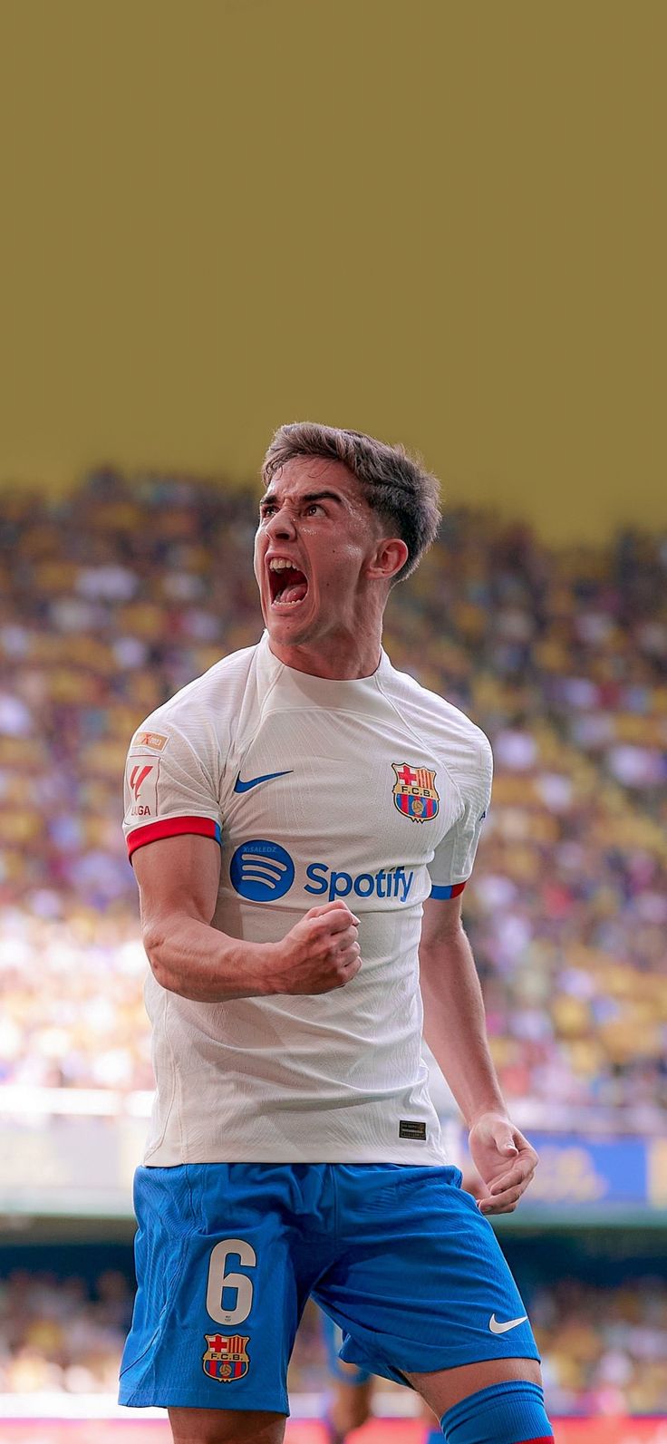 a soccer player with his mouth wide open