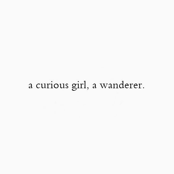 a white wall with the words a curious girl, a wanderr