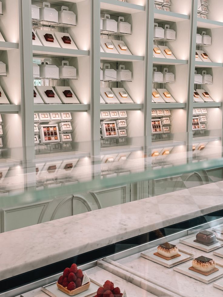 a display case filled with lots of different types of desserts