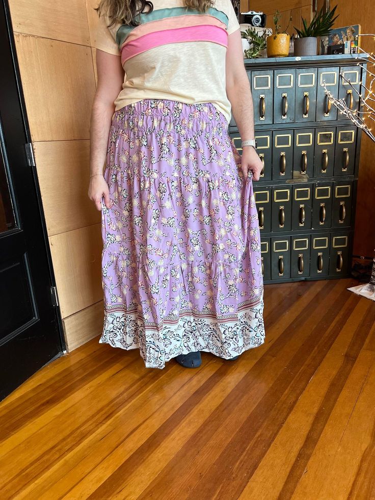 "Transform your look with our versatile purple floral maxi skirt! Lightweight and flowy, it's perfect for spring and summer. Wear as a skirt or convert it into a tube dress for a feminine and pretty style. Embrace the unexpected with this playful piece." Floral Maxi Skirt, Pretty Style, The Unexpected, Tube Dress, Floral Maxi, Purple Floral, Summer Wear, Maxi Skirt, Skirt