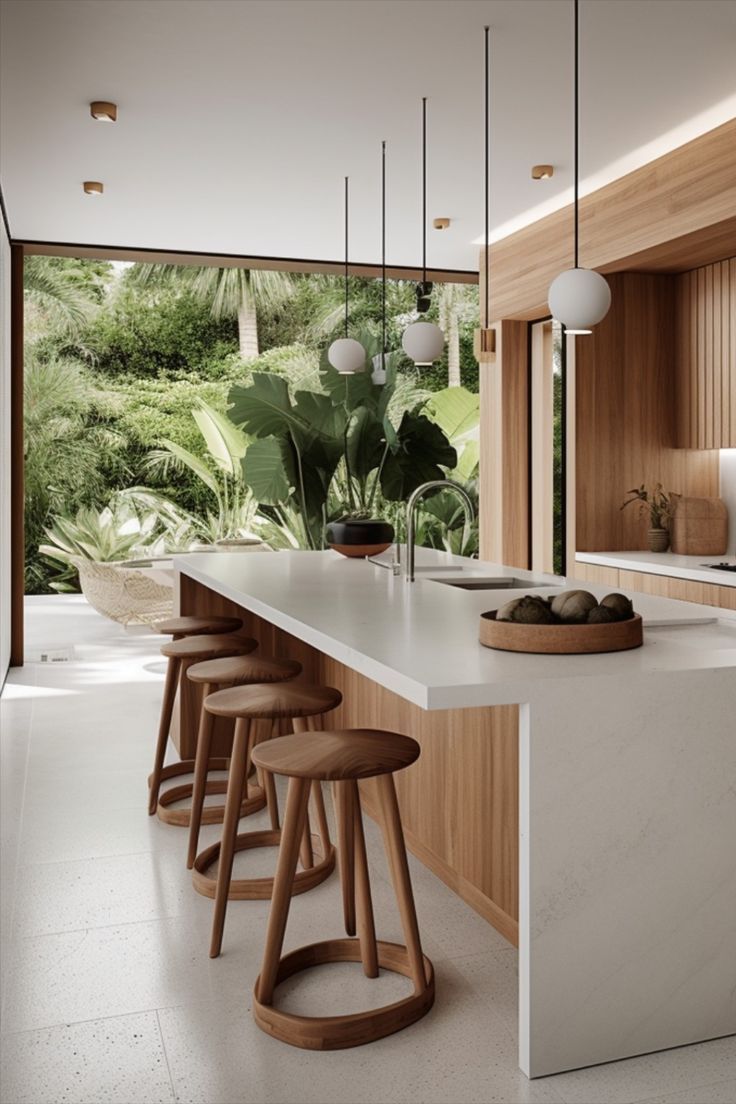 a kitchen with white counter tops and wooden stools