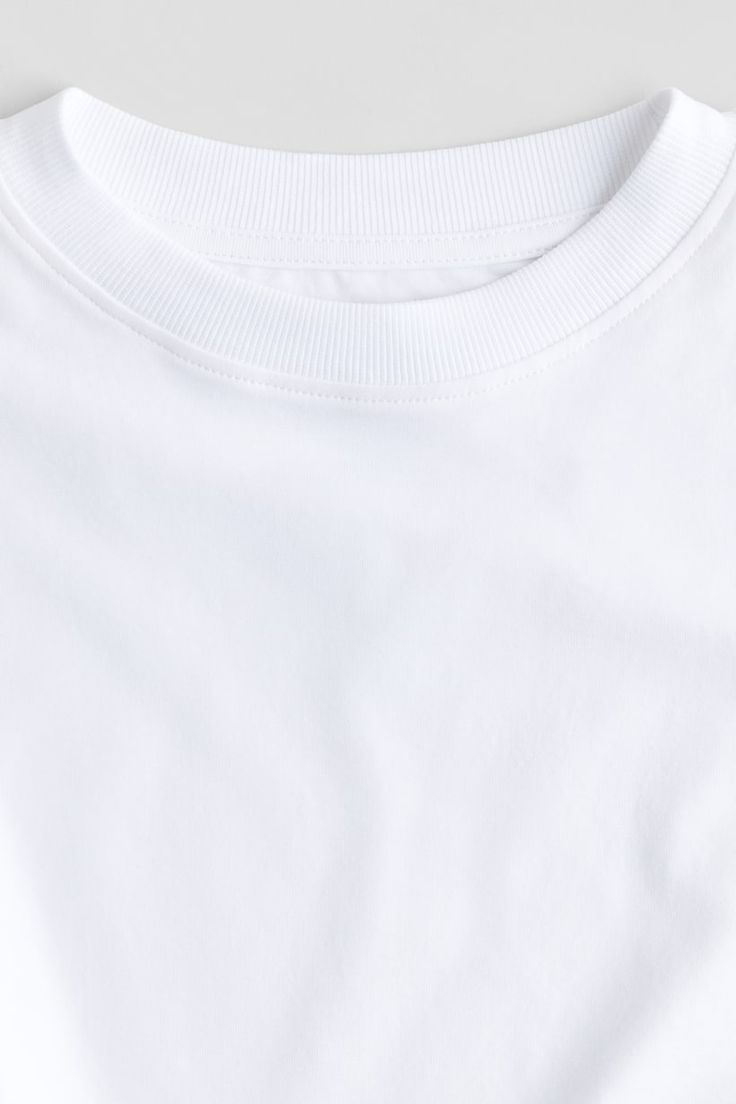 Long-Sleeved Cotton Top - White - Kids | H&M US Loose Fitting Tops, Top Round, Ribbed Neckline, Cotton Top, Cotton Tops, White Long Sleeve, Workout Tops, H&m, Loose Fitting