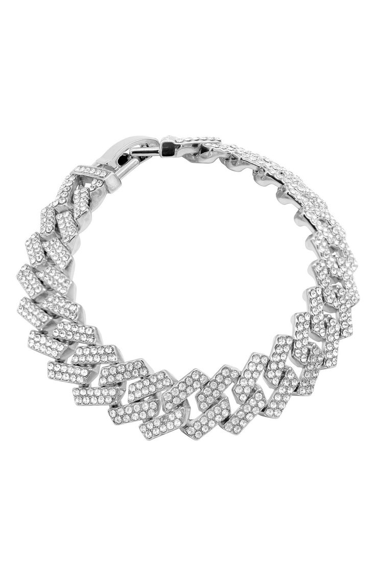 Pavé cubic zirconia bring glamorous sparkle to a curb-chain bracelet with a polished rhodium-plated finish. 8 1/2" length; 1/2" width Fold-over clasp White rhodium plate/cubic zirconia Imported Silver Diamond Chain Bracelets, Silver Diamond Link Bracelet, Silver Chain Link Diamond Bracelet For Formal Occasions, Formal Silver Chain Link Diamond Bracelet, Iced Out Crystal Chain Link Jewelry, Elegant Silver Diamond Bracelet With Curb Chain, Elegant Silver Diamond Curb Chain Bracelet, Silver Cuban Link Bracelet With Diamond Accents, Diamond Cuban Link Chain Bracelet In Silver