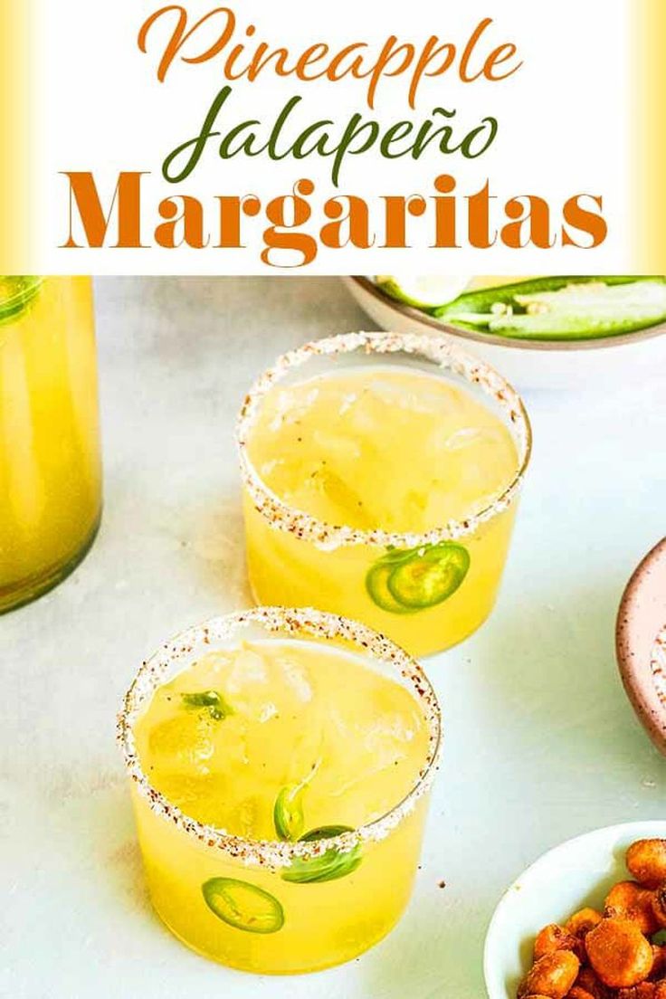 pineapple jalapeno margaritas are served in glasses with garnishes