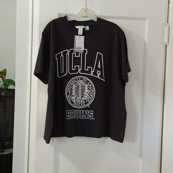 Nwt, Ucla T-Shirt H&m Relaxed Fit T-shirt With Graphic Print, H&m Relaxed Fit T-shirt For Streetwear, College Graphic Tee Tops With Graphic Print, College Graphic Tee Tops, College Style Cotton T-shirt With Graphic Print, H&m Crew Neck T-shirt With Letter Print, Sporty H&m Crew Neck Tops, H&m Sporty Crew Neck Tops, Relaxed Fit Graphic Print T-shirt In College Style