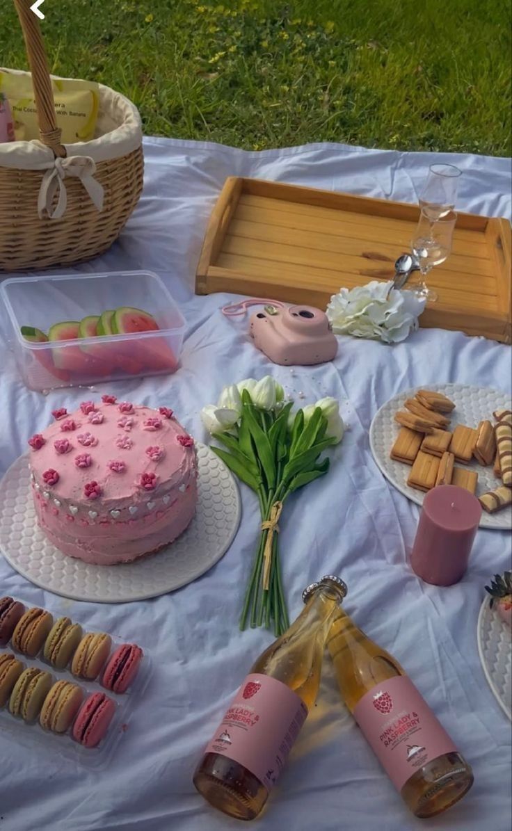 a table topped with lots of cakes and desserts