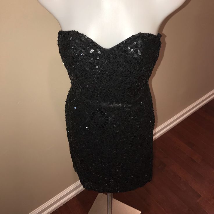 Beautiful Black Bead And Sequined Dress With Gorgeous Pattern. Nwt. Smoke Free. Black Embellished Strapless Evening Dress, Black Embellished Strapless Dress, Black Sequined Strapless Mini Dress, Black Strapless Sequin Dress For Prom, Black Strapless Mini Dress With Sequins, Beaded Dress With Sweetheart Neckline For Party, Beaded Sweetheart Neckline Party Dress, Sweetheart Neckline Beaded Party Dress, Black Embellished Mini Dress With Sweetheart Neckline