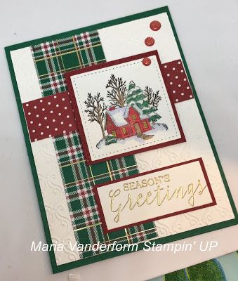 a christmas card with a house and tree on it, surrounded by green plaid paper