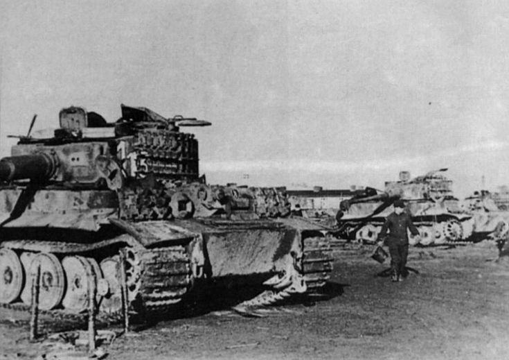 an old black and white photo of tanks