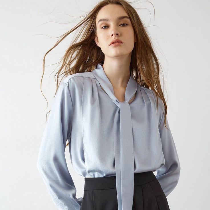 This Shirt Has A Necktie, V-Neckline, And Long Sleeves With Wide Cuff. Perfect For Wearing With High Waisted Pants Or To The Office. Available In White And Cornflower Blue. No Stretch Medium Weight Regular Fit Fabric: 100% Polyester Model Is 177cm/5'9" Tall, 80cm/31" Bust, 59cm/23" Waist And 89cm/35" Hip And Wears A Size S. Care Instruction: Machine Wash At Or Below 30c, Do Not Bleach, Line Dry In Shade, Iron Cool (Max 110c), Dry Clean, Tetrachloroethylene(Pce) Only. Tie Shirt, Wide Cuff, Cornflower Blue, Necktie, High Waisted Pants, Medium Weight, The Office, Neck Tie, Colorful Shirts