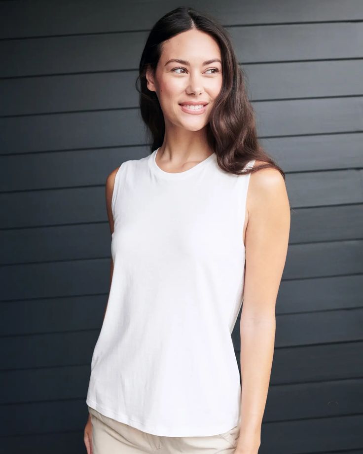 Cotton Modal Muscle Tank Relaxed Washed Tops For Summer, Cotton Tank Tops Athleisure Style, White Cotton Muscle Tee Athleisure, Relaxed Washed Cotton Tops, Cotton Relaxed Fit Muscle Tee For Athleisure, Spring Relaxation Tank Top, Relaxed Fit Cotton Muscle Tee For Athleisure, Casual Cotton Muscle Tee For Workout, Cotton Tank Top For Relaxation