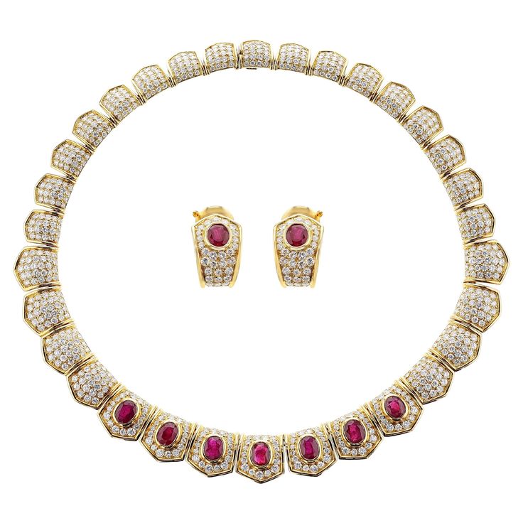 Van Cleef and Arpels Necklace and Earrings set with Ruby and Diamonds. French, Maker's Mark for Pery et Fils. The necklace weighs 87.60 grams with approximately 16 carats of Diamonds and approximately 10.50 carats of Rubies. Diamonds are all E-FG Color, VVS-VS Clarity. The Inner circumference of the Necklace is 14.25 inches and outer is circumference is 16 inches. The Earrings weigh 14.34 grams, and the length is 0.85 inches. Rubies weigh approximately 4 carats and diamonds 2.50 carats. Van Cleef Arpels Necklace, Jewelry Van Cleef, Diamond Necklace And Earrings, Van Cleef Necklace, Ruby Diamond Necklace, Ruby And Diamond Necklace, Van Cleef And Arpels Jewelry, Van Cleef & Arpels, Alexis Bittar Jewelry