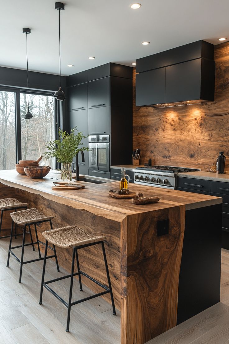 a large kitchen island with stools next to it