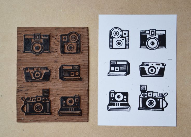 two rubber stamps with different types of cameras on them