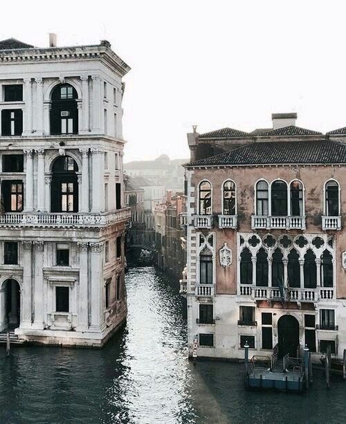 an old building next to a canal in venice