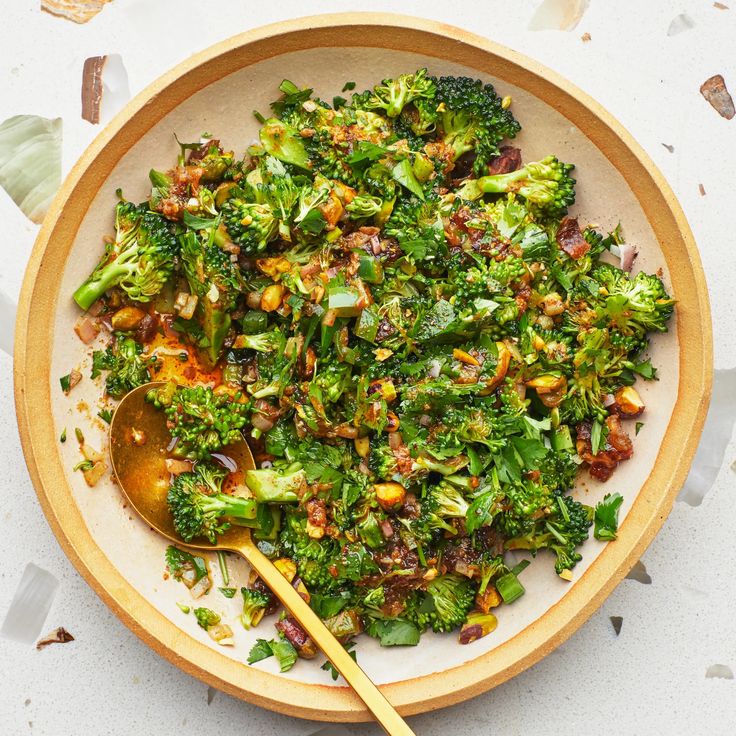 a bowl filled with broccoli and other vegetables