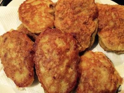 some fried food is on a white plate