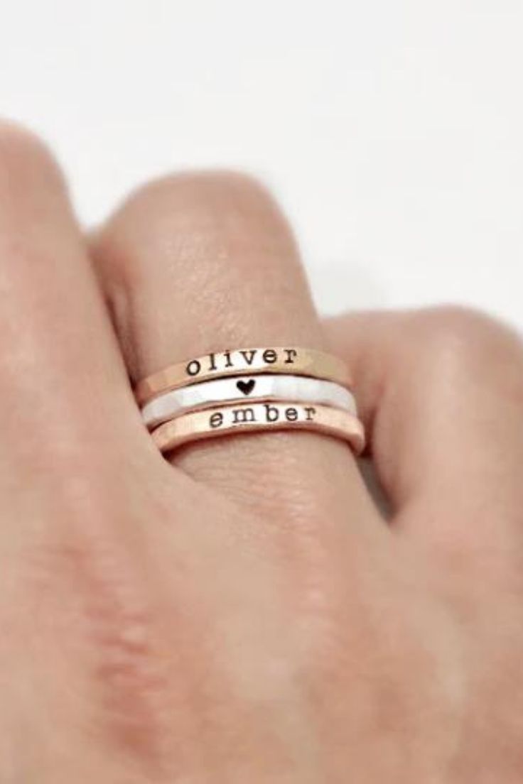 Looking for meaningful couple band rings with names? These name rings for couples are the perfect way to keep your love close! Explore our collection of carved name rings and name rings for couples here! Stacked 14k Gold Rings For Gift, Stacked 14k Gold Rings As Gift, Stacked Rings In 14k Gold As Gift, Dainty Stacked Rings As A Gift, Minimalist Stacked Rings As Gift, Minimalist Stacked Rings Gift, Stacked 14k Gold Jewelry For Anniversary, Stackable Rose Gold Sterling Silver Midi Rings, Custom Name Rose Gold Jewelry For Anniversary