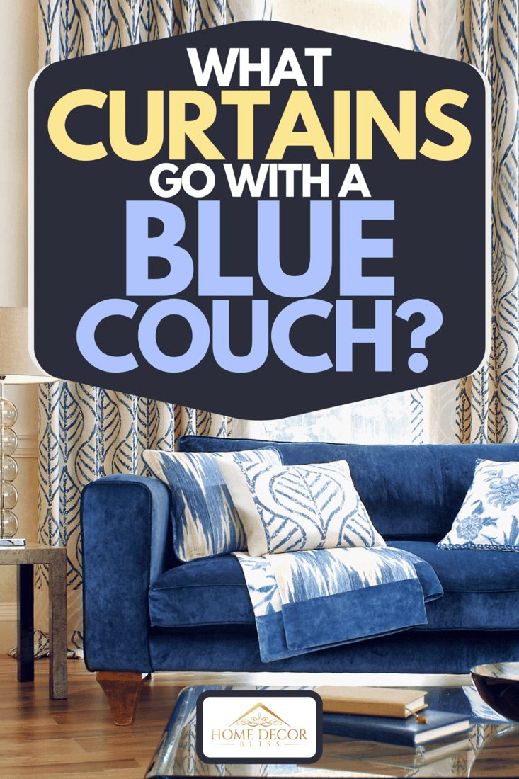 a blue couch sitting in front of a window with the words what curtains go with a blue couch?