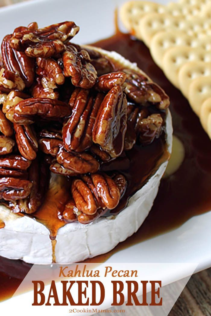 baked brie with pecans and caramel drizzled on the side