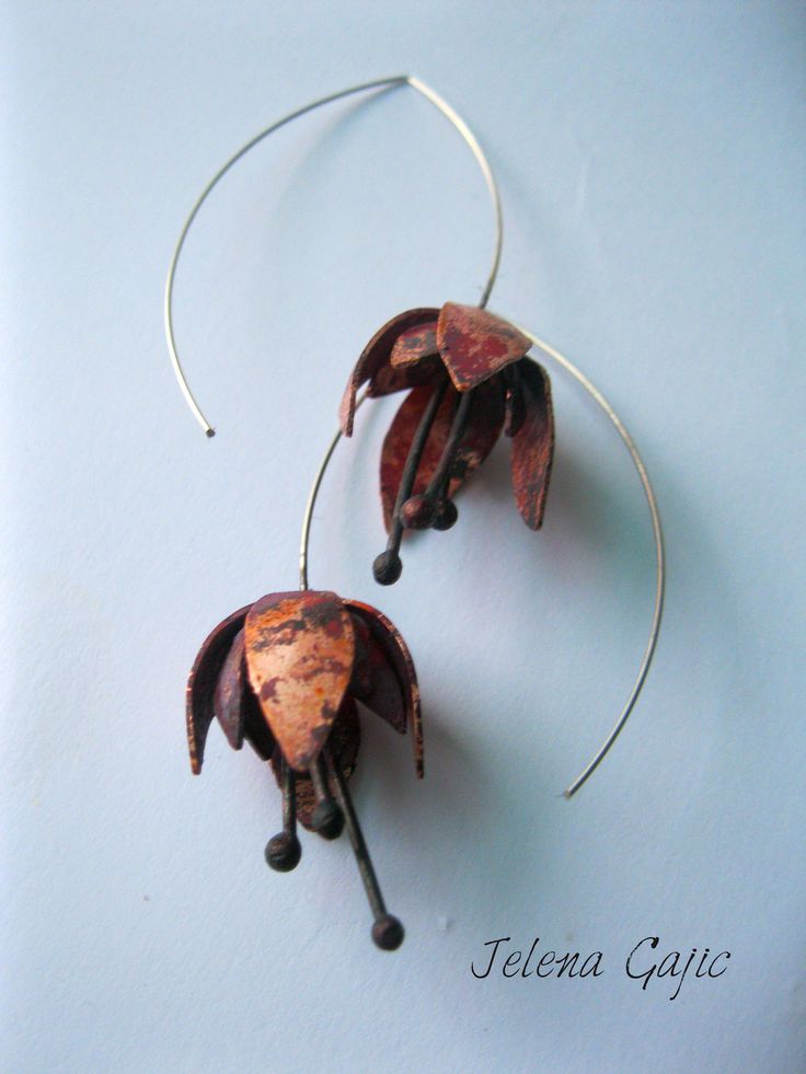 "Handmade earrings made of copper, inspiration from the flower. The width of the flower earrings is 2-2.5 cm, total length of the earring is 5.5 cm. Ear hook is made of silver wire. Every item is gift wrapped free of charge. A personalized note can be included with any item, please include your desired message during your purchase. If you have any questions, I would be glad to answer :) Please order items early to assure holiday delivery and thank you for taking time for visiting my shop Dear cu Copper Drop Earrings With Flower And Ear Wire, Copper Drop Flower Earrings With Ear Wire, Handmade Copper Flower Earrings, Artistic Flower-shaped Earrings With Ear Wire, Copper Drop Flower Earrings As Gift, Adjustable Copper Flower Earrings, Brown Flower Earrings With Ear Wire, Handmade Copper Flower Drop Earrings, Ear Hangers