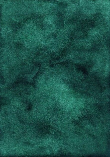 a dark green area rug with an uneven design