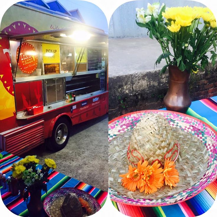 an image of food truck with flowers on the table