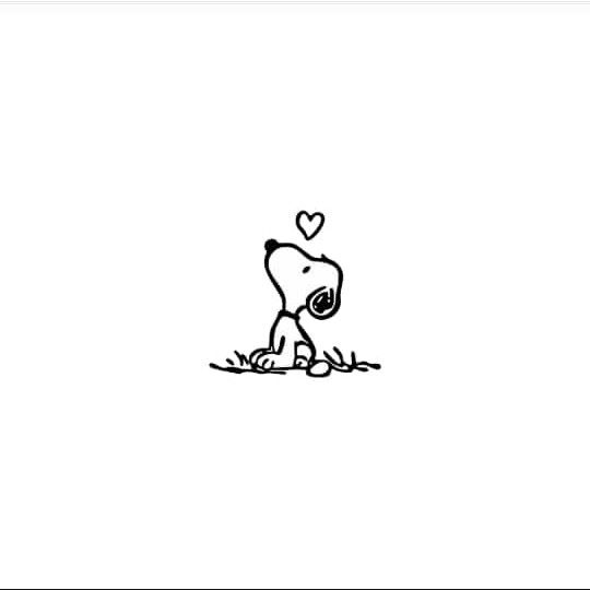 a black and white drawing of a dog with a heart