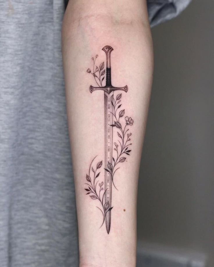 65 Epic Sword Tattoo Ideas: Unleash Your Inner Warrior - ARTWOONZ Tattoo Bicep, Lotr Tattoo, Bookish Tattoos, Spirit Tattoo, Inner Forearm Tattoo, Fantasy Tattoos, Dagger Tattoo, 1 Tattoo, Book Tattoo