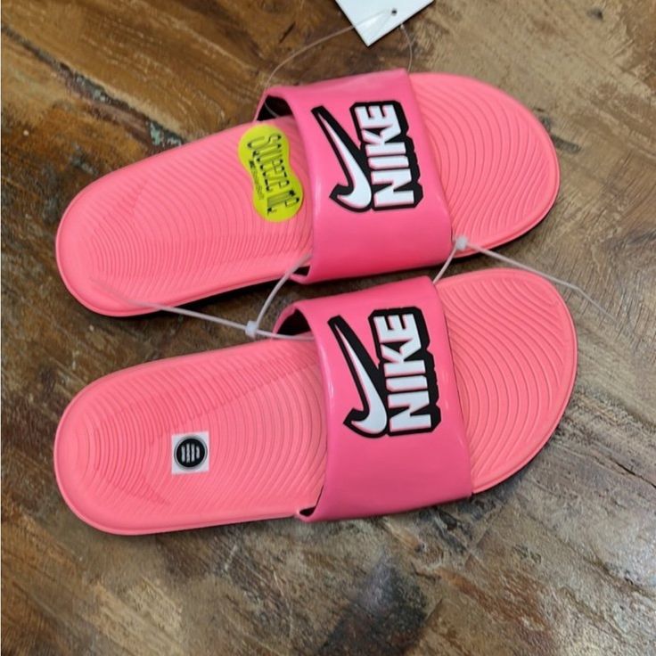 Let Your Kids Squish Around In Comfort With The Nike Kawa Slide Fun. The Bright, Funky, And Unbelievably Fun Slides Are Perfect For All-Day Wear. So Unbelievably Comfortable And Squishy, These Slip-Ons Are Bound To Be Instant Favorites With Your Kids. Easy To Slip Into, Impossible To Give Up, These Slides Simply Go With Everything. Nike Kawa Slide Fun Features: Synthetic Leather Strap Provides Durability And Easy Cleaning. Soft Foam Midsole Ensures Ample Cushioning. Outsole With Grooves Provide Playful Non-slip Synthetic Slides, Non-slip Synthetic Fun Slides, Fun Non-slip Synthetic Slides, Pink Slip-resistant Sneakers For Summer, Pink Casual Slides With Round Toe, Comfortable Pink Synthetic Slides, Comfortable Pink Slides, Casual Training Slides For Spring, Pink Round Toe Casual Slides