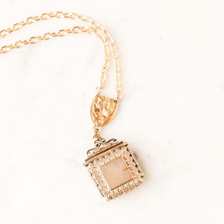 This one-of-a-kind necklace is composed of: Victorian watch fob clasp and locket from the late 1800s featuring a hand-carved Cat's Eye stone cameo on the front. This necklace measures a standard 18” on a 14k gold filled chain. The pendant and clasp hang down 2" in length. Gold Rectangular Pendant Necklace For Keepsake, Antique Gold Necklace With Vintage Charm For Keepsake, Luxury Gold Cameo Necklace, Victorian Necklace With Detachable Pendant, Victorian Necklaces With Detachable Pendant, Timeless Vintage Charm Necklace Gift, Timeless Vintage Charm Necklaces For Gifts, Timeless Vintage Charm Necklace, Timeless Vintage Charm Necklace For Gift