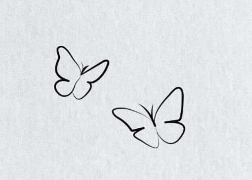 two butterflies flying in the air on a white paper background with black lines and dots