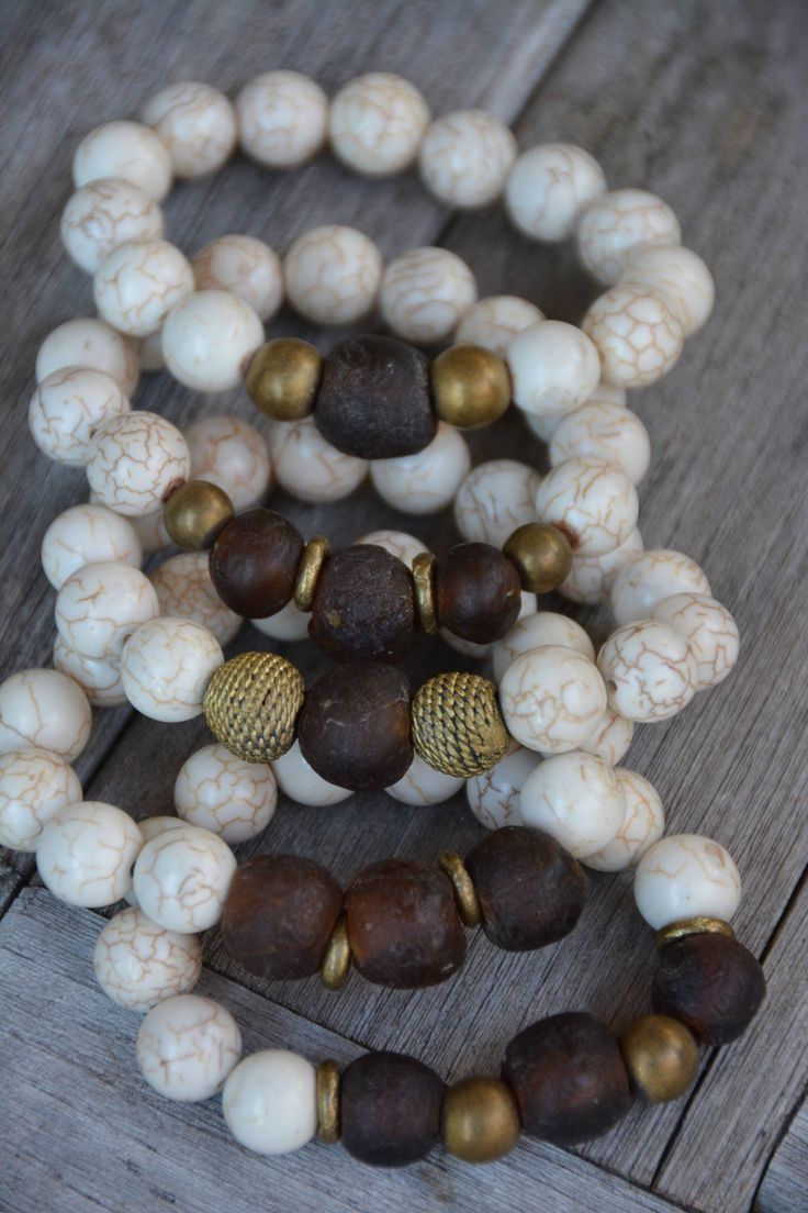 Assorted African Trade Bead Bracelets Bohemian Brown Stretch Bracelet With Large Beads, Brown Wooden Beaded Bracelet, Brown Wooden Beads For Bracelets, Bohemian Brown Stretch Bracelet With Spacer Beads, Earthy Brown Beaded Bracelets With Large Beads, Spiritual Brown Bracelets With Large Beads, Brown Spiritual Bracelets With Large Beads, Earthy Brown Bracelet For Beach, Earthy Brown Bracelets For The Beach