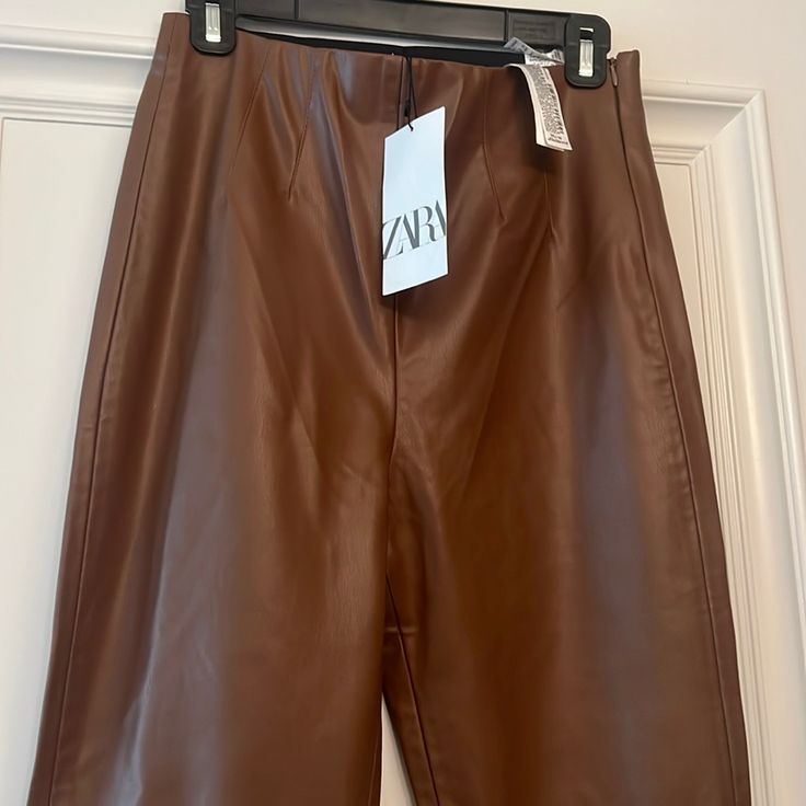 Brand New With Tags, Zara Size Medium Never Been Worn But The Stitching Has Come Loose On The Back And Would Need Sewing Brown High-waisted Leather Pants For Spring, Brown Leather Zara Bottoms, Zara Leather Bottoms In Brown, Zara Brown Leather Bottoms, Zara Brown Leather Pants For Fall, Zara High Waist Brown Leather Pants, Chic Brown Zara Leather Pants, Chic Brown Leather Pants By Zara, Brown Faux Leather Pants