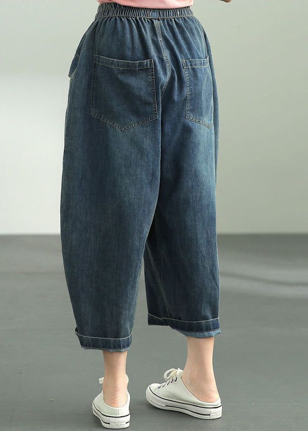 Loose Dark Blue Elastic Waist Oversized Big Pockets Cotton Denim Harem Pants SummerFabric: Cotton BlendedSize & Fit: This garment fits true to size.Length: Size 3XL measures 31.2"from waist to hem.Waist:Fitted - elastic waist allows stretch Hip: Loosely Fitted. room for hips. Hand Wash Cold. Oversized Mid-rise Pants With Pockets, Spring Baggy Medium Wash Cropped Jeans, Spring Baggy Dark Wash Cropped Jeans, Baggy Washed Blue Jeans For Summer, Spring Baggy Blue Cropped Jeans, Baggy Wide Leg Cropped Jeans In Medium Wash, Oversized Washed Pants For Spring, Summer Baggy Washed Blue Jeans, Spring Blue Baggy Cropped Jeans