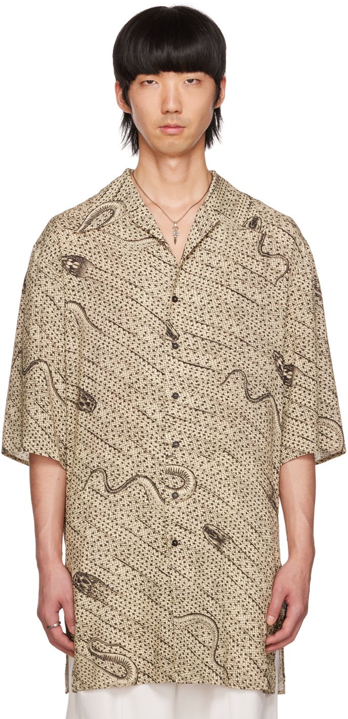 Plain-woven Ecovero™ and viscose-blend shirt. Graphic pattern printed throughout. · Open spread collar · Button closure · Vented side-seams Supplier color: Light wrapped snakes Patterned Relaxed Fit Shirt With Camp Collar, Relaxed Fit Hawaiian Shirt With Collar And Print, Relaxed Fit Collared Hawaiian Shirt With Print, Relaxed Fit Hawaiian Shirt With Collar, Collared Hawaiian Shirt With All Over Print, Relaxed Fit Printed Collared Shirt, Collared Camp Shirt With All Over Print, Patterned Shirt With Spread Collar In Relaxed Fit, Beige Printed Shirt With Relaxed Fit