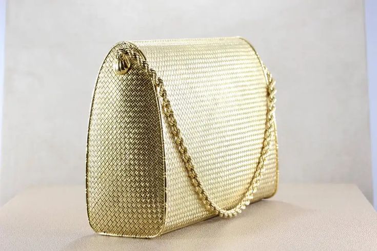 For Sale on 1stdibs - A special piece made in Cartier's Paris workshops, a diamond studded gold evening purse. In excellent condition, this purse opens to reveal a mirror and Gold Diamond Studs, Gold Handbags, Evening Purse, Beaded Purses, Diamond Gold, A Mirror, Objet D'art, Diamond Studs, Cartier