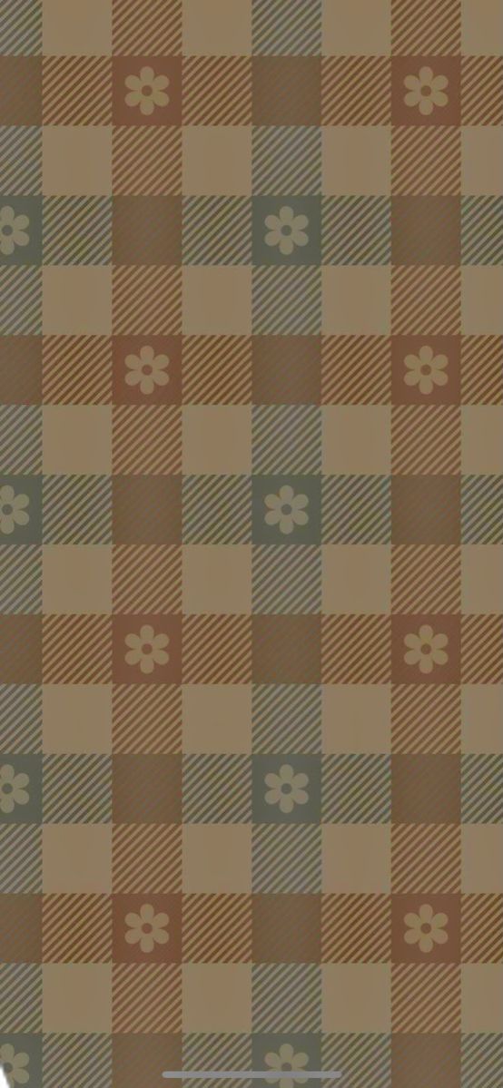 a brown and tan plaid wallpaper with flowers on it