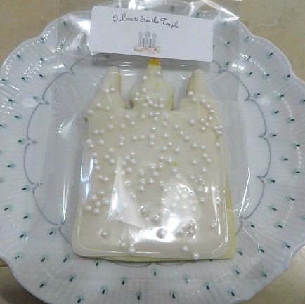 a plastic bag with pearls on it sitting on a plate