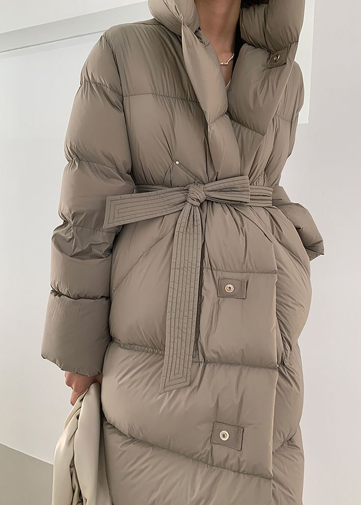 Stay warm and elegant this winter wearing our luxurious Queenie Coat. Crafted from superior goose down, this hooded, belted coat offers superior insulation and protection from the cold. Our exclusive design ensures that this coat is both stylish and comfortable; perfect for winter evenings. Details & care Fixed hood Front-button closure Lined, with 800-fill-power down 90% goose down, 10% feather Nylon Dry clean Women's coat Item #312901 Size info XS=US2=UK6=EU32 S=US4-6=UK8-10=EU34-36 M=US8-10=U Luxury Winter Parka With Double-lined Hood, Luxury Long Puffer Jacket With Detachable Hood, Luxury Nylon Hooded Jacket With Detachable Hood, Luxury Functional Down Hooded Jacket, Luxury Down Hooded Jacket With Adjustable Hood, Luxury Double-lined Hood Puffer Jacket For Cold Weather, Luxury Long Sleeve Puffer Jacket With Adjustable Hood, Luxury Weatherproof Nylon Hooded Jacket, Luxury Windproof Outerwear For Cold Weather