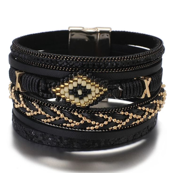 Cuff Bracelet Evil Eye Design Metal: Zinc Alloy Color: Black, Gold & Other See Pics Pattern: Rope/Braided Closure Type: Magnetic Total Length: 7.3/4" Total Width: 1.3/4" Bundle Up For Discounted Shipping Elegant Black Metal Braided Bracelets, Elegant Black Metal Wrap Bracelet, Elegant Black Wrap Bracelet, Handmade Metal Braided Bracelets In Black, Handmade Black Metal Braided Bracelets, Black Bohemian Leather Bracelet, Black Beaded Bohemian Leather Bracelet, Trendy Black Metal Beaded Bracelets, Black Bohemian Bracelet